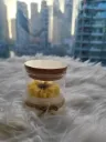 Yellow Daisy flower candle in small  jar